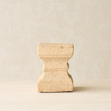 Reclaimed sandstone candle pedestal handcrafted from solid sandstone salvaged from a historic building in India.