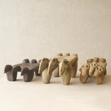 Vintage Naga Tribal Stool Natural handcrafted from solid hardwood in Nagaland, India, featuring a sculptural hand-carved design and natural restored finish.