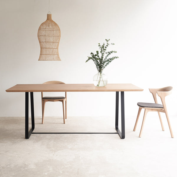 Oak dining table with black sleigh base | Originals Furniture Singapore