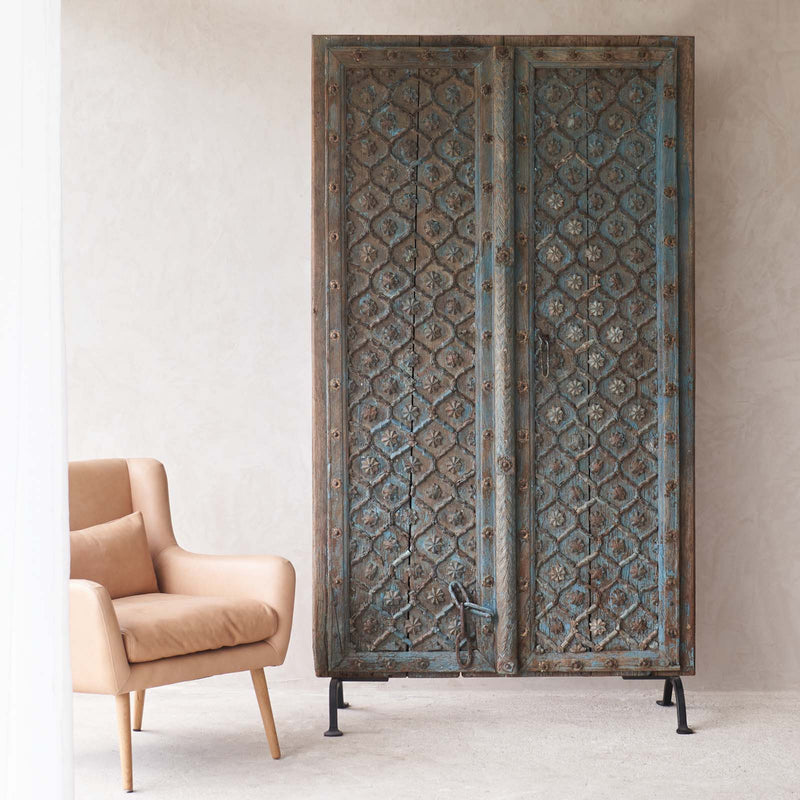 Blue Door with Carved Flower Motifs