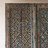 Blue Door with Carved Flower Motifs