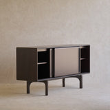 Modern black cabinet on a beige background