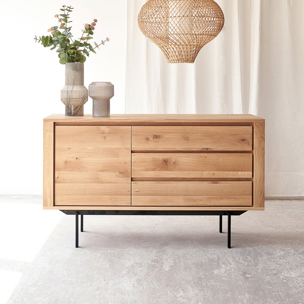 Ethnicraft shadow oak sideboard 1 door 3 drawers crafted from high quality European oak with adjustable shelves and soft closing blum - $2590