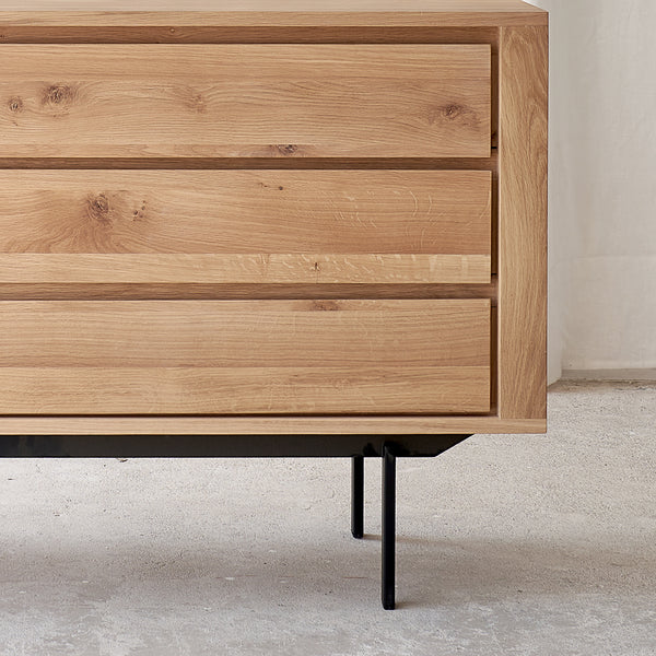 Ethnicraft shadow oak sideboard 1 door 3 drawers crafted from high quality European oak with adjustable shelves and soft closing blum - $2590