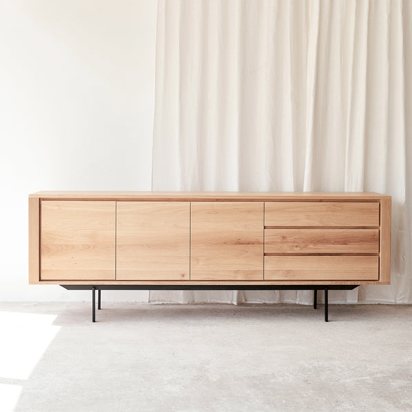 Ethnicraft shadow oak sideboard 3 door 3 drawers crafted from high quality European oak with adjustable shelves and soft closing blum - $3960