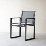 Harbour Outdoor Piano Dining Chair With Arms in Asteroid Dark Grey from Originals Furniture Singapore