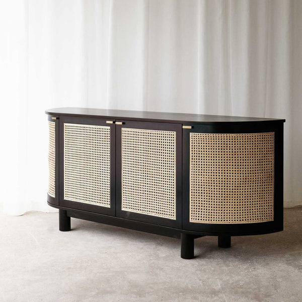 Naumi teak rattan sideboard black with rattan inlay crafted with sustainably sourced teak and fixed shelves - $3280