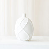 Ventano Vase, statement textured piece to bring a room together. Unique design that adds drama to a room. Suitable for any living space. Available in different sizes from $160. 