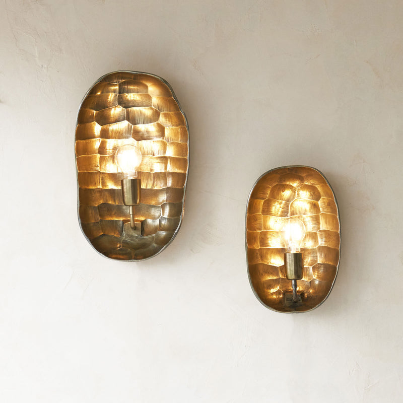 Maku Wall Lamp, statement textured piece to bring a room together. Unique shape and finish that adds drama to a room. Suitable for any living space. Available in different sizes from $280.