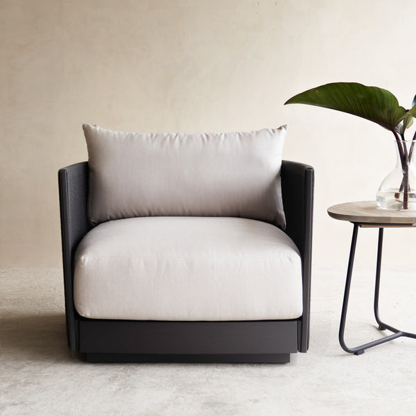 Antigua Outdoor Armchair, subtle, comfortable curves, built for all-weather resistance. Available at $2800.