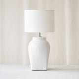 Hekla Table Lamp, white, timeless accessory. Contemporary and versatile piece that provides a flair of simplicity in any home. Available at $280.