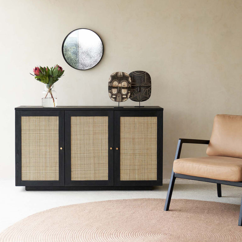 Hudson Black Teak Rattan Sideboard, 3 Doors, Square Webbing. Rattan details and metal handles with generous storage. Versatile and timeless piece. Available at $3280.