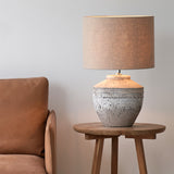 Toba Table Lamp, textured finish. Unique and versatile piece that provides a touch of drama in any home. Available at $360.