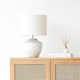 Toba Table Lamp, textured finish. Unique and versatile piece that provides a touch of drama in any home. Available at $360.
