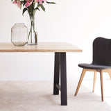 Java teak dining table in whitewash with black A-frame base and lily dining chairs in black - Originals Furniture Singapore