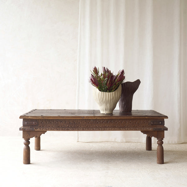 Vintage Teak Coffee Table handcrafted from reclaimed solid teak with a light natural finish and traditional carved details.