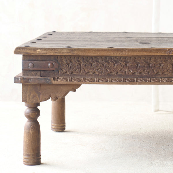 Vintage Teak Coffee Table handcrafted from reclaimed solid teak with a light natural finish and traditional carved details.