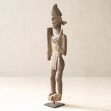 Vintage Naga Tribal Wood Sculpture handcrafted from solid hardwood in Nagaland, India and displayed on a steel stand.