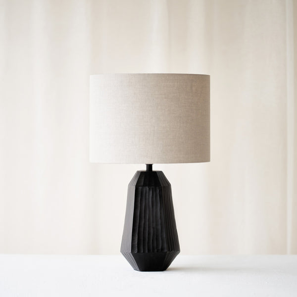 Mirissa Table Lamp, black and geometric shaped. Sophisticated and stylish piece. It is a versatile piece that provides a touch of luxury and a contemporary feel in any home. Available at $380.