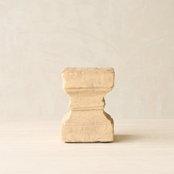 Reclaimed sandstone candle pedestal handcrafted from solid sandstone salvaged from a historic building in India.