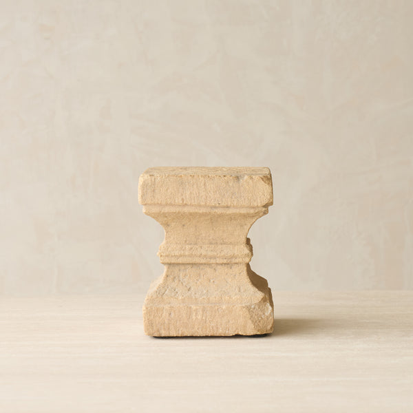 Reclaimed sandstone candle pedestal handcrafted from solid sandstone salvaged from a historic building in India.
