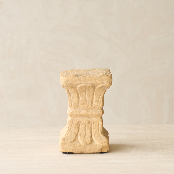 Reclaimed sandstone candle pedestal handcrafted from solid sandstone salvaged from a historic building in India.