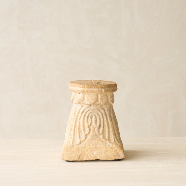 Reclaimed sandstone candle pedestal handcrafted from solid sandstone salvaged from a historic building in India.