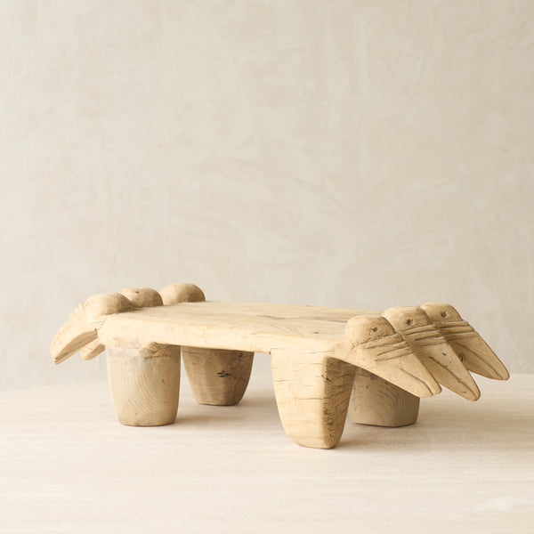 Vintage Naga Tribal Stool Natural handcrafted from solid hardwood in Nagaland, India, featuring a sculptural hand-carved design and natural restored finish.