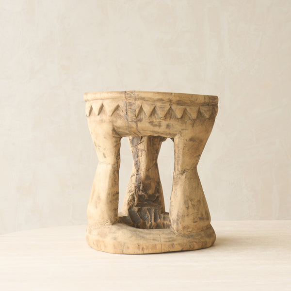 Vintage Naga Tribal Side Table Natural handcrafted from solid hardwood in Nagaland, India with a sculptural hand-carved design and natural restored finish.