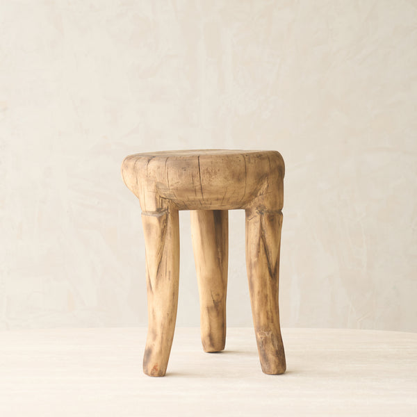 Vintage Naga Tribal Side Table Natural handcrafted from solid hardwood in Nagaland, India with a sculptural hand-carved design and natural restored finish.