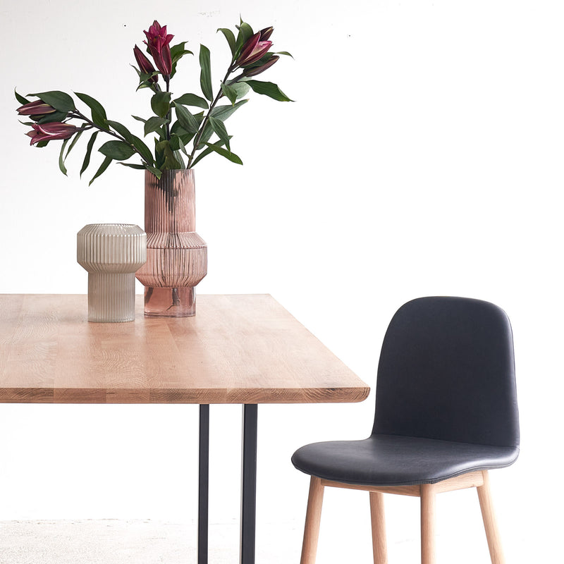Oak dining table with black U base - Originals Furniture Singapore