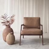 Nysse leather armchair in canyon with walnut frame - Originals Furniture Singapore