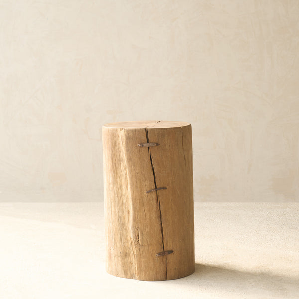 Reclaimed Indian solid wood log pedestal handcrafted from a salvaged timber log, suitable as a side table or display pedestal.