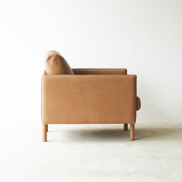 Tolv Canyon Pensive Leather Armchair from Originals Furniture Singapore