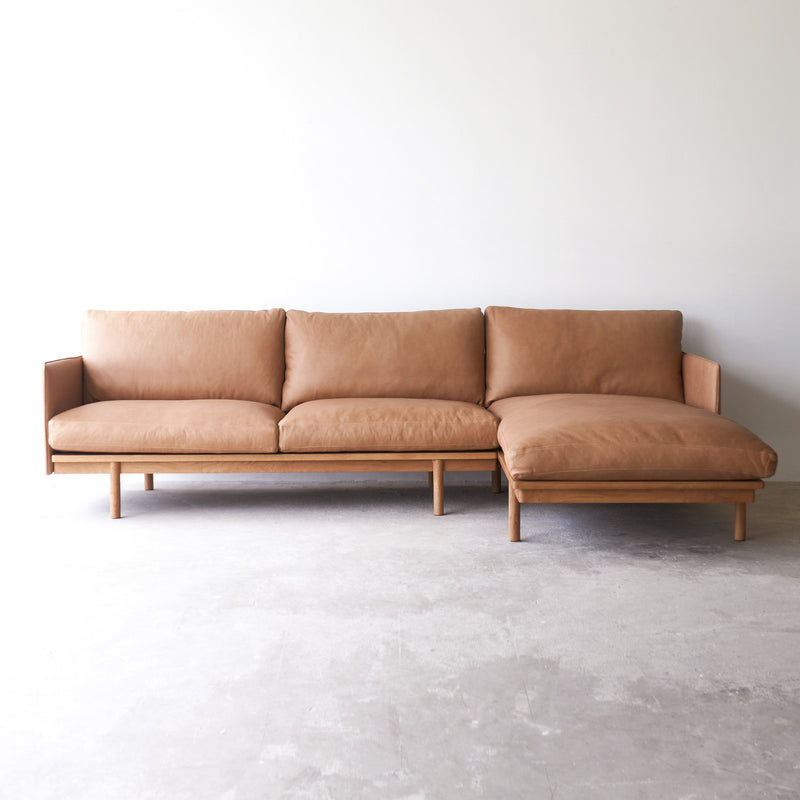Tolv pensive L shape leather sofa bespoke - Originals Furniture Singapore