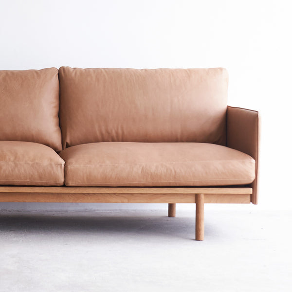 Tolv pensive L shape leather sofa bespoke - Originals Furniture Singapore