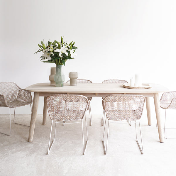 Icon outdoor teak dining table in whitewash with violet outdoor dining chairs in linen - Originals Furniture Singapore 