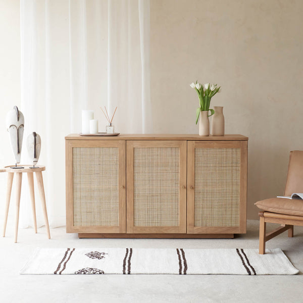 Hudson Natural Teak Rattan Sideboard, 3 Doors, Square Webbing. Rattan details and metal handles with generous storage. Versatile and timeless piece. Available at $3280.