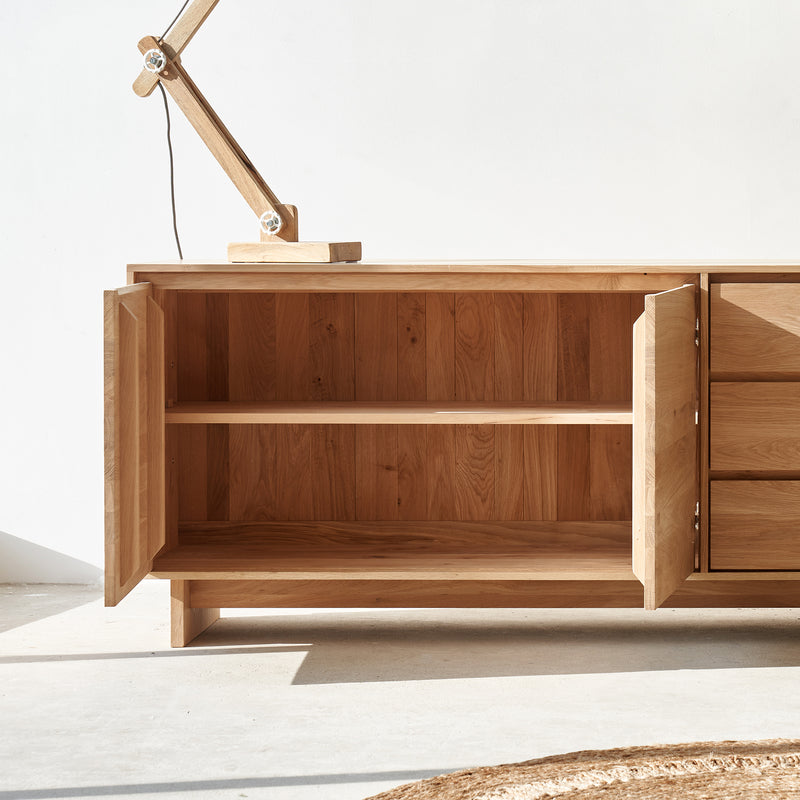 Ethnicraft wave oak sideboard 2 doors 3 drawers crafted from high quality European oak with removable shelves and soft closing blum drawer runners - $3860