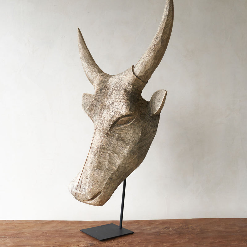Carved Headdress, Unique wooden bull head home accessory from Africa. Solid Dogwood, local African hardwood. Handcarved, one-of-a-kind touch for any home. From $580