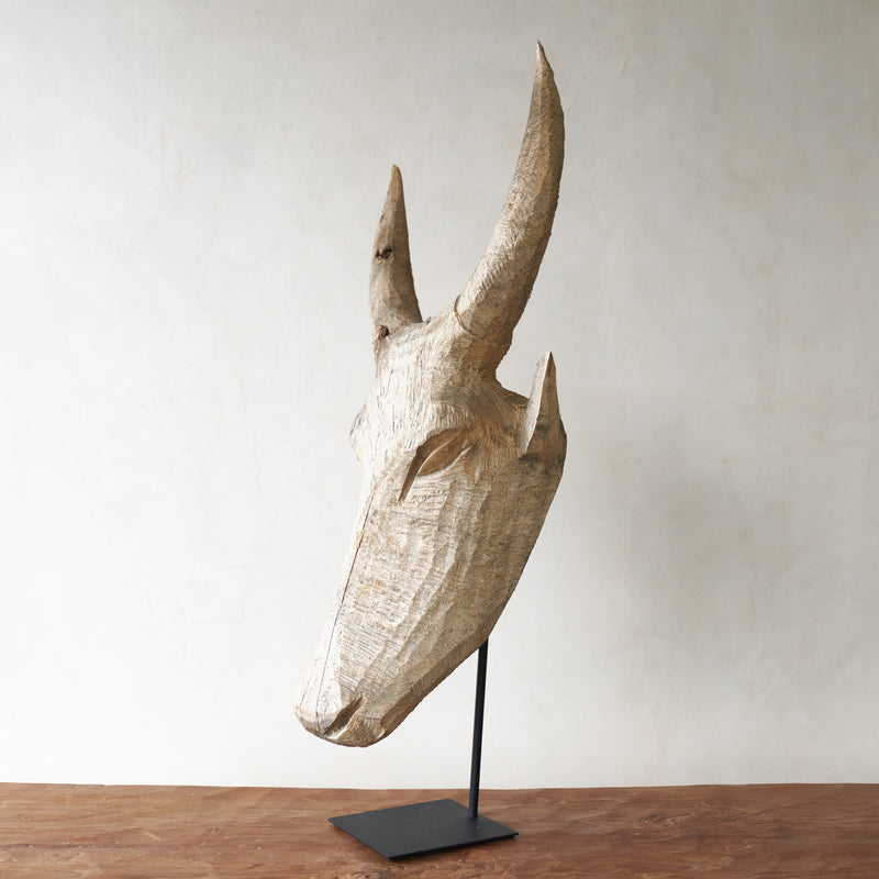 Carved Headdress, Unique wooden bull head home accessory from Africa. Solid Dogwood, local African hardwood. Handcarved, one-of-a-kind touch for any home. From $580