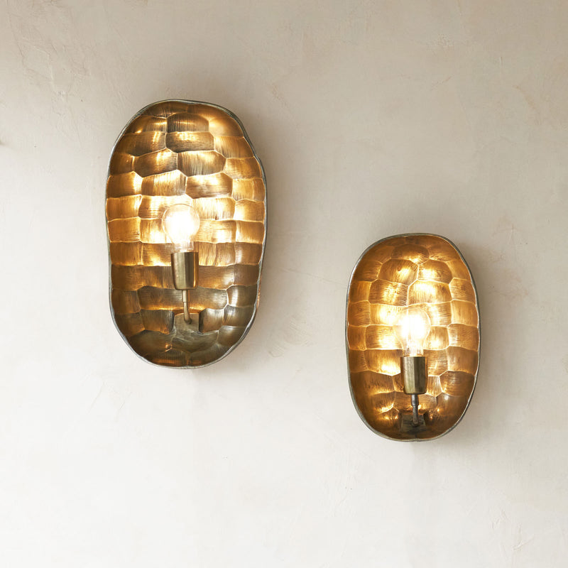 Maku Wall Lamp, statement textured piece to bring a room together. Unique shape and finish that adds drama to a room. Suitable for any living space. Available in different sizes from $280. 