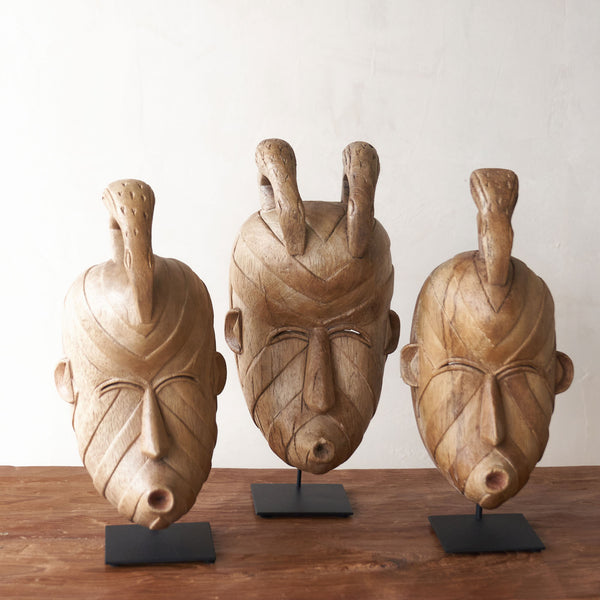 Songye Mask, hand-carved from local wood. Each is an original unique piece. these authentic African masks make for a stunning visual in any space. From $240