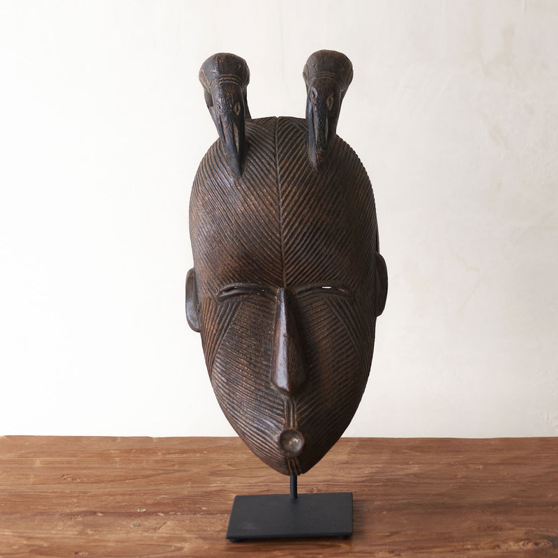 Songye Mask, hand-carved from local wood. Each is an original unique piece. these authentic African masks make for a stunning visual in any space. From $240