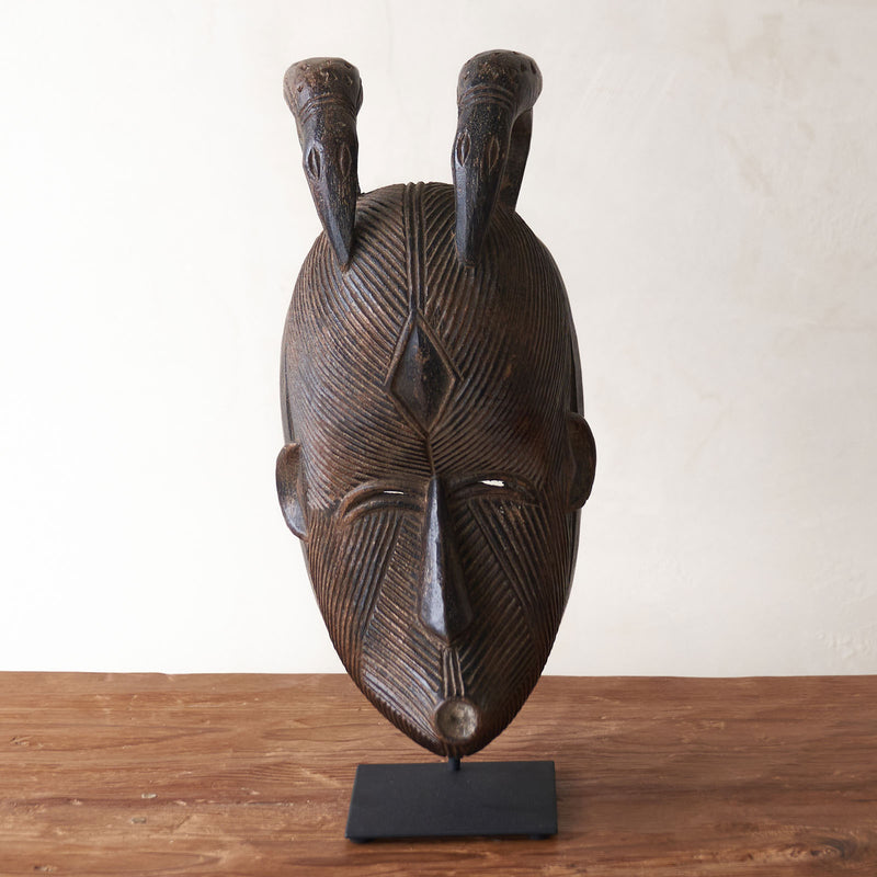 Songye Mask, hand-carved from local wood. Each is an original unique piece. these authentic African masks make for a stunning visual in any space. From $240