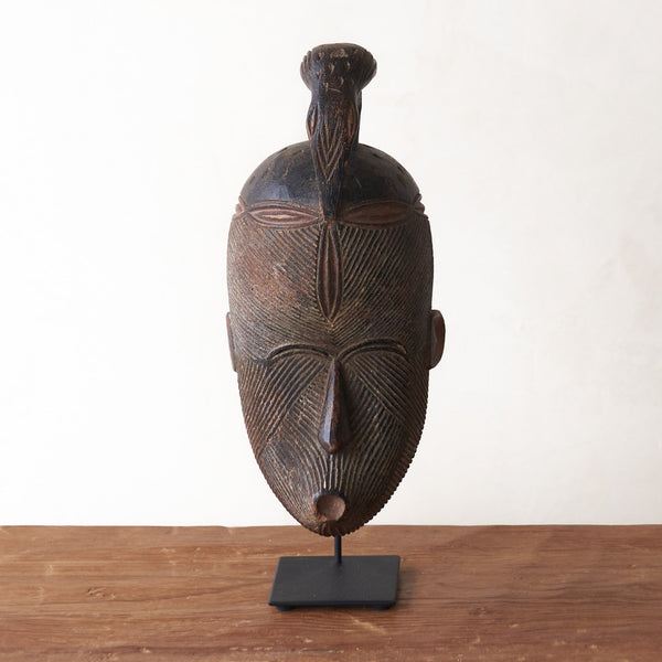 Songye Mask, hand-carved from local wood. Each is an original unique piece. these authentic African masks make for a stunning visual in any space. From $240