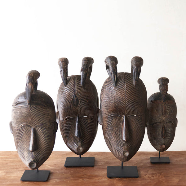 Songye Mask, hand-carved from local wood. Each is an original unique piece. these authentic African masks make for a stunning visual in any space. From $240