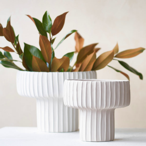 Maja Pot, cream cement/stone accessory. A modern yet subtle, neutral look in your home. Add a touch of personality to the interior with its texture. Available in different sizes from $160.