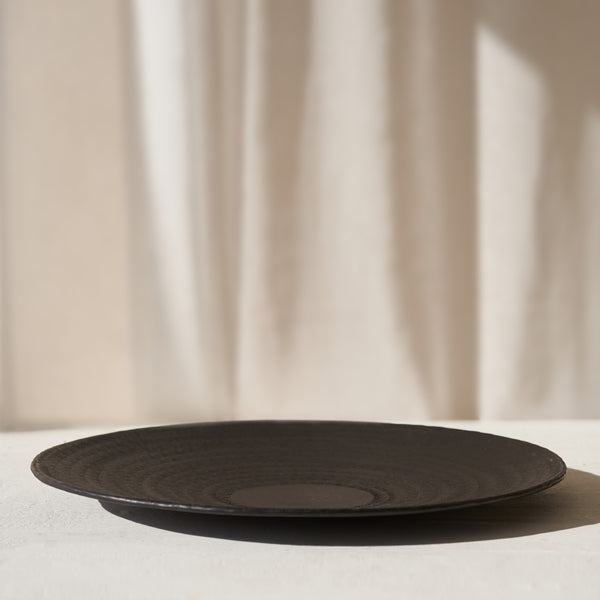 Larre Dish, metal black accessory. Style it in any space as a distinctive accessory that adds a finishing touch to your interior. Available in black at $80. 