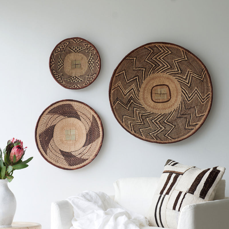 Tonga Basket, Unique home accessory from Africa. Hand-woven baskets used for wall decoration. Variations exist in colours and sizes. From $80